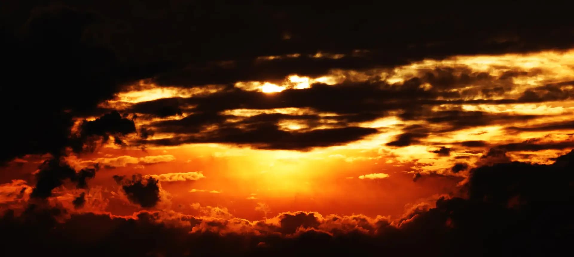 Just after the sunset.. The sky became reddish orange. With the clouds and the colors, it felt like heaven.