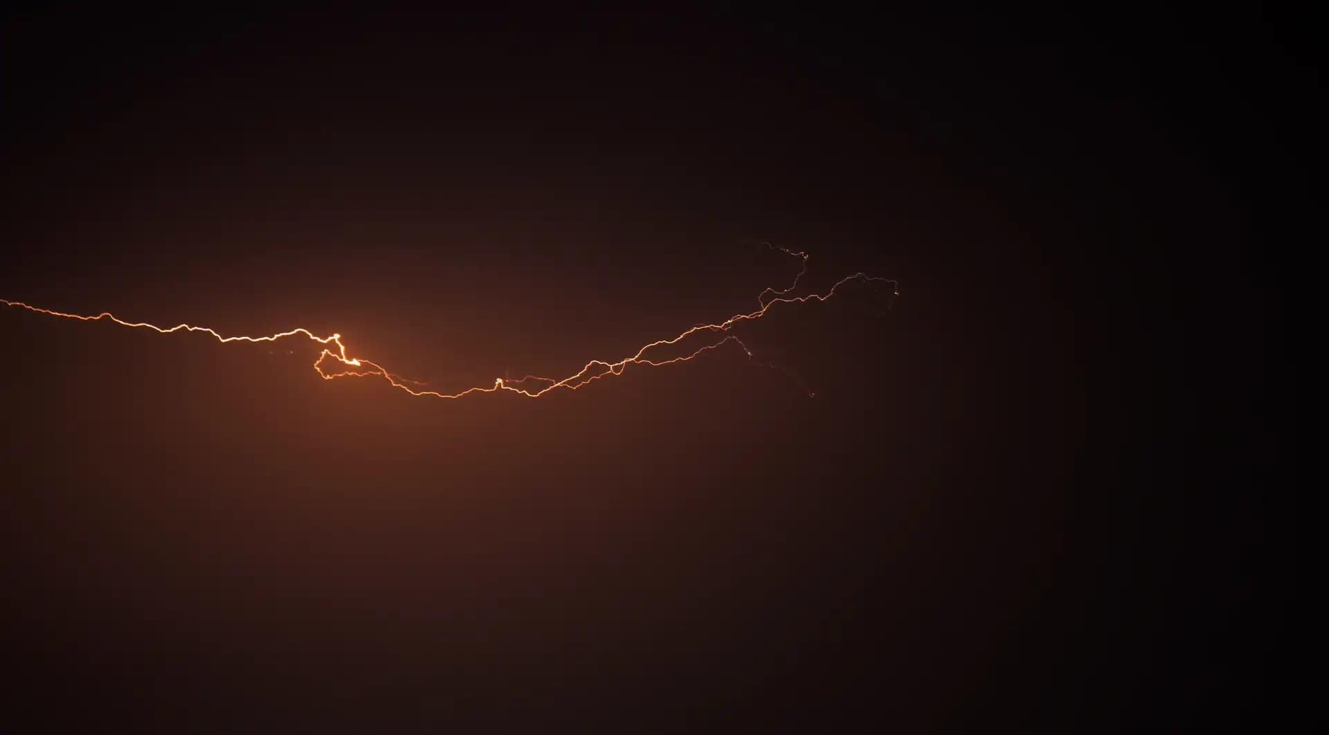 The sky was roaring and lightnings were falling all night. I took my camera and went to the roof to take some shots. It was risky but I got some good shots in the end.